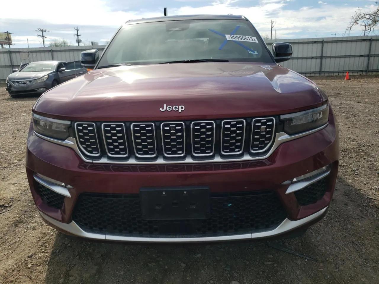 2022 Jeep Grand Cherokee VIN 1C4RJHEG8N8605255 - photo 1 of 13